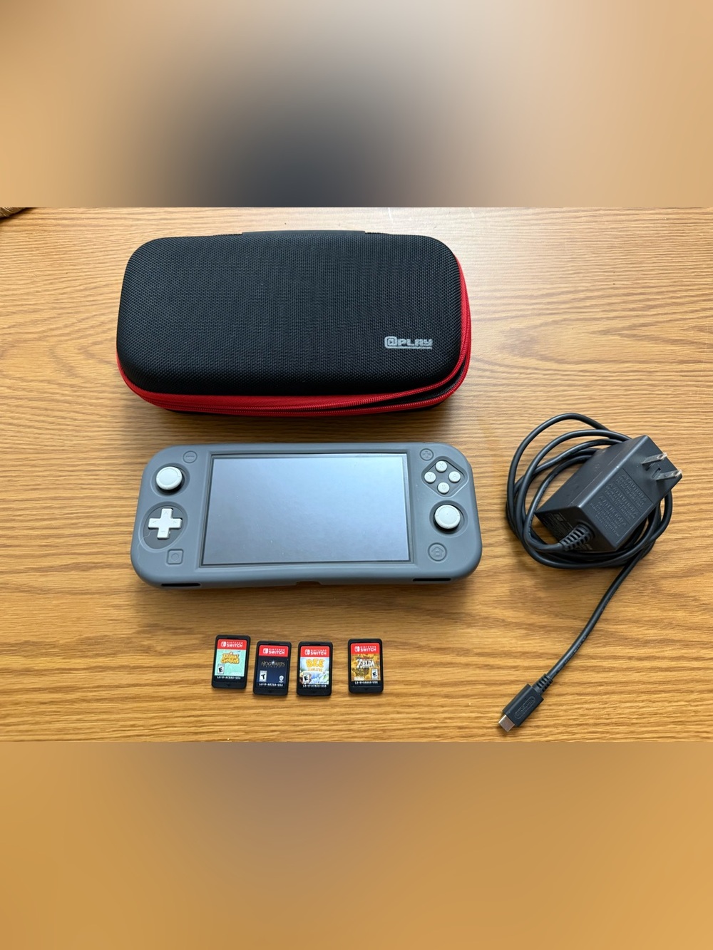 Nintendo Switch Lite Bundle – 4 Games, Case & Charger